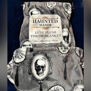 Haunted Manor Blanket with Skulls
